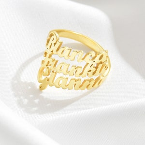 May include: Gold ring with the names "Blanca", "Frankie", and "Gianna" engraved on it.