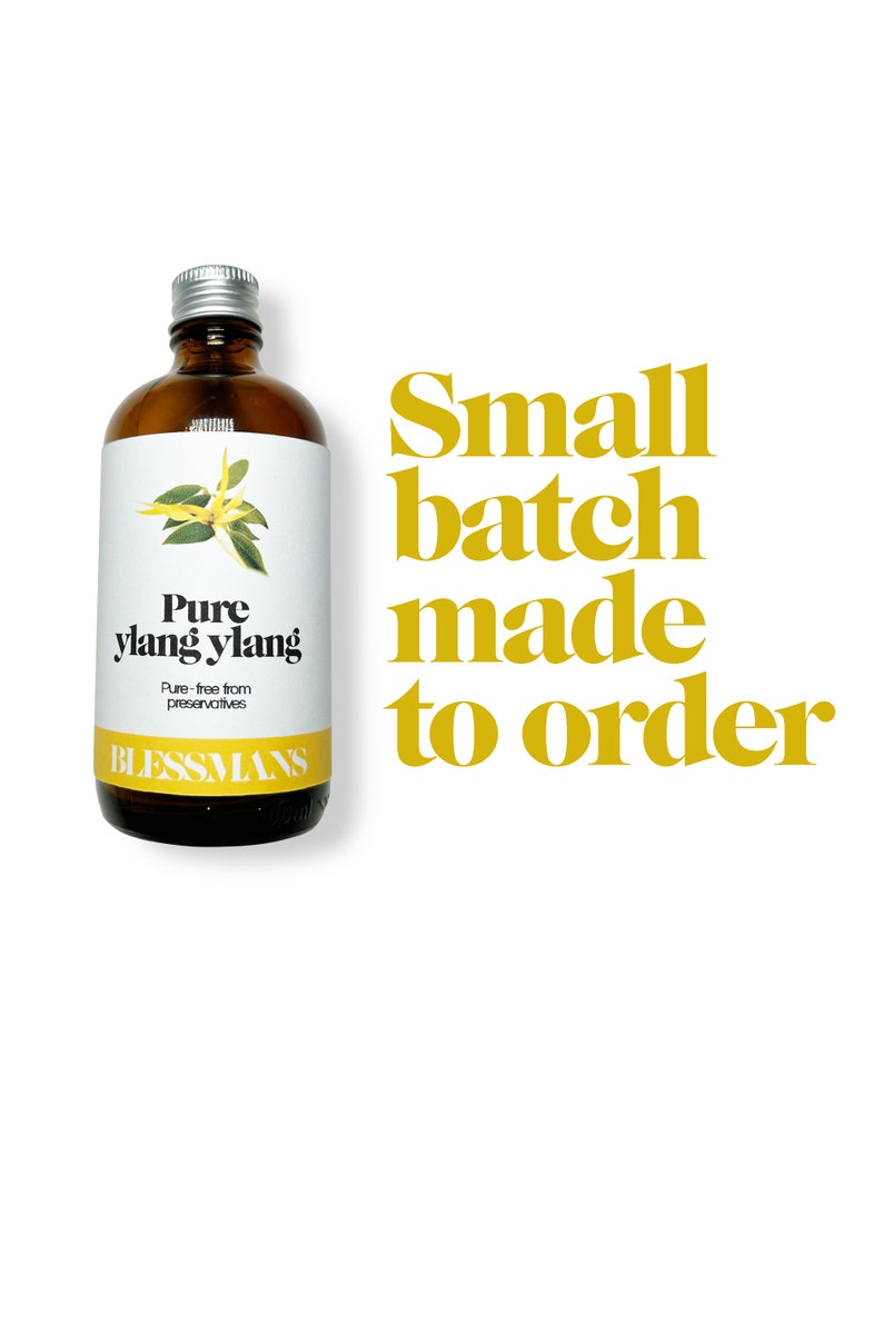 May include: A brown glass bottle with a silver lid, labeled "Pure ylang ylang" and "Blessmans". The bottle is filled with a clear liquid. The text "Small batch made to order" is written in yellow letters on a white background.