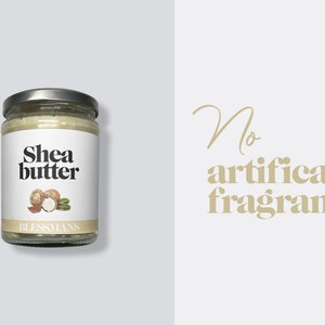 May include: A glass jar of shea butter with a white label that says "Shea butter" and has a drawing of shea nuts. The jar is on a light gray background. The text "No artificial fragrances" is written in a light brown color on a white background.