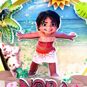 May include: A 3D cake topper featuring Moana from the Disney movie Moana. Moana is wearing a red and white patterned top and a pink and orange skirt. She is standing on a beach with a blue ocean and a palm tree in the background. The cake topper also includes a small pig.