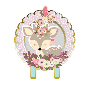 May include: A cute cartoon deer with a floral crown and a pink and white teepee behind it. The deer is surrounded by pink, white, and green flowers. The image is set against a background of a gold and pink lace circle.