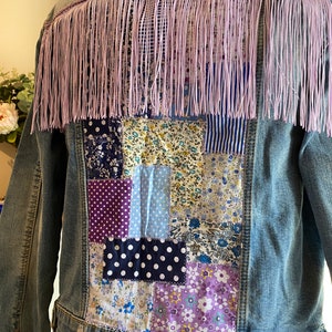 Reworked Boho/festival inspired denim jacket with patchwork panel and fringe