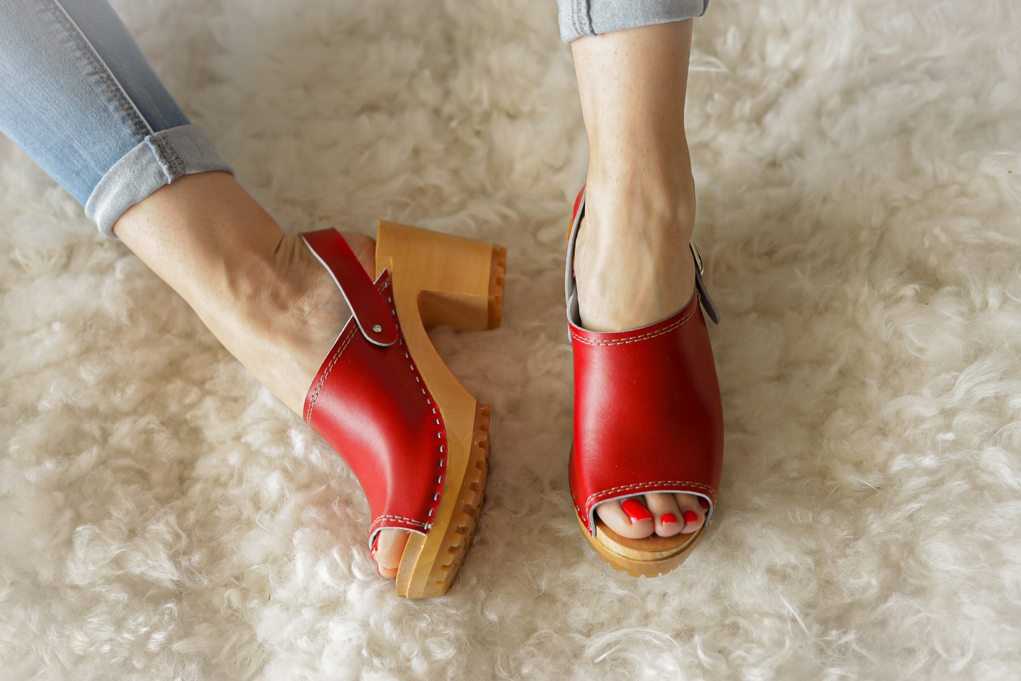 leather clogs with wooden heels