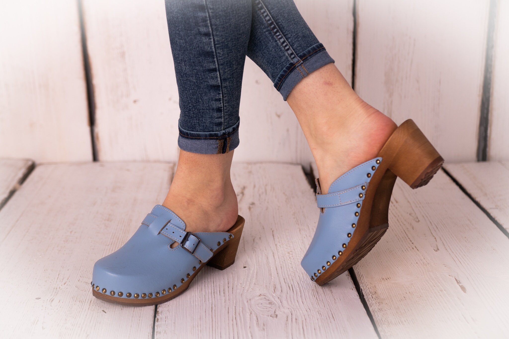 leather clogs with wooden heels