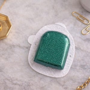 Aufkleber mit Smaragdschimmer Süßer, grüner glänzender Sticker