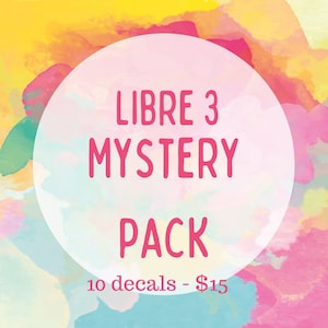 May include: A colorful graphic with a watercolor background in yellow, pink, and blue. The text "LIBRE 3 MYSTERY PACK" is in pink, inside a white circle. Below, it says "10 decals".