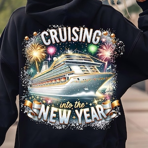 May include: Black hoodie with a graphic of a cruise ship sailing into fireworks with the text "Cruising into the New Year".