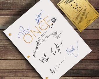 May include: A white script titled "ONCE UPON A TIME" with multiple signatures in blue and black ink. The script is held together with gold brads. An "AUTOGRAPH KEY" card is in the upper right corner.