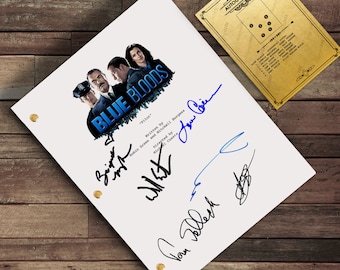 May include: A white script from the television show "Blue Bloods" with multiple signatures in blue and black ink. The script has the show's logo and the title "Pilot". An autograph key is also present.