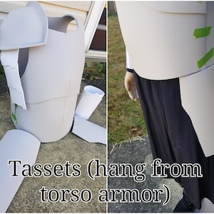 May include: A white foam armor set for cosplay. The set includes a chest piece, shoulder pads, and tassets that hang from the torso armor. The tassets are labeled "Tassets (hang from torso armor)".
