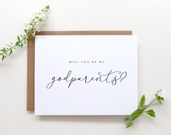 May include: A white card with brown envelope, with the text "Will you be my godparents?" in black calligraphy.