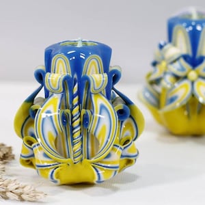 Light a Candle for Ukraine: Handcrafted Blue and Yellow Carved Candle