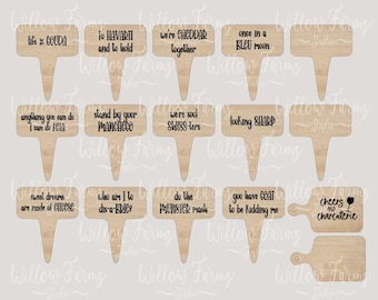 May include: A set of 14 laser cut wooden cheese markers with funny puns and sayings. The markers are designed to be used as wedding favors or gifts. The text on the markers includes "Life is Gouda", "To Havarti and to hold", "We're Cheddar together", "Once in a Bleu Moon", "Anything you can do I can do Feta", "Stand by your Manchego", "We're so Swiss-ers", "Looking Sharp", "Sweet dreams are made of Cheese", "Who am I to Brie-lieve", "Do like the Munster rolls", "You have Goat to be kidding me", "Cheers to Charcuterie".
