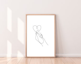 Op de afbeelding: Een zwart-witte lijntekening van een hand die een hartvorm maakt met zijn vingers.