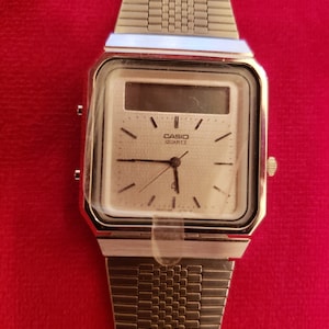 Casio Janus AT-552] Finally got the one watch I remember wanting most as a  kid looking through old Casio adverts. Calculator watch you enter digits  via drawing them on the screen, super
