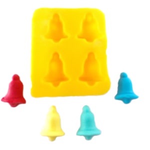 May include: A yellow silicone mold with four bell-shaped cavities. Four bells are shown in different colors: red, yellow, blue, and light blue.