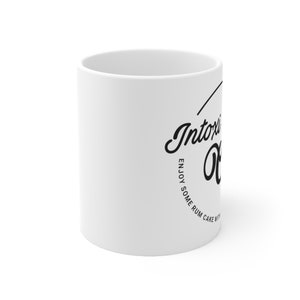 Intoxi-Cake-Tion left hand Ceramic Mug 11oz logo facing out image 2