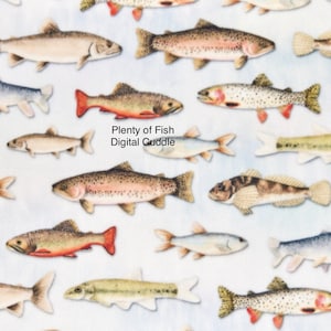May include: A white background with a repeating pattern of various types of fish. The fish are illustrated in a realistic style with detailed markings and colors. The text "Plenty of Fish Digital Cuddle" is written in the center of the image.