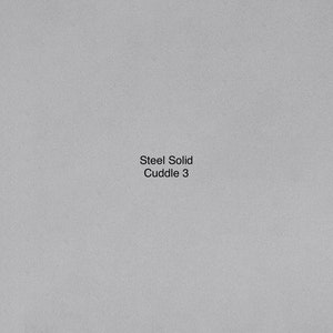 May include: A gray background with the text "Steel Solid Cuddle 3" in black.