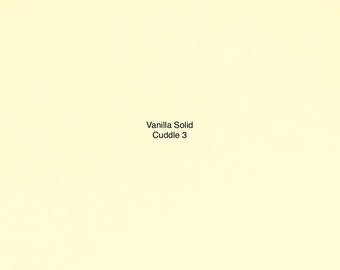 Puede incluir: Una tarjeta blanca lisa con el texto "Vanilla Solid Cuddle 3" impreso en negro.