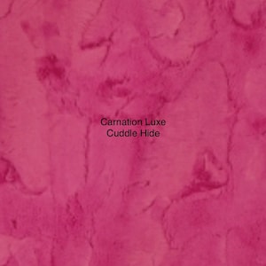 May include: A close-up of a pink textured surface with the text "Carnation Luxe Cuddle Hide" in black.