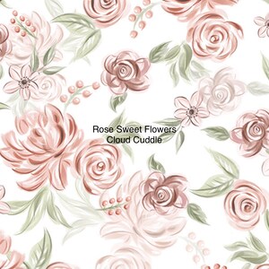 May include: A seamless pattern featuring watercolor-style pink and brown roses, white flowers, and green leaves on a white background. The text "Rose Sweet Flowers Cloud Cuddle" is centered on the pattern.