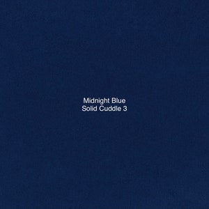 May include: A solid blue fabric swatch with the text "Midnight Blue Solid Cuddle 3" in white.