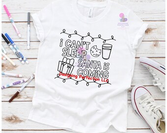 Camiseta para colorear navideña para niños: concurso de galletas y repostería, camiseta juvenil de Santa que viene a la ciudad