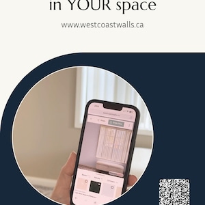 a person holding a cell phone with the text view this wallpaper in your space