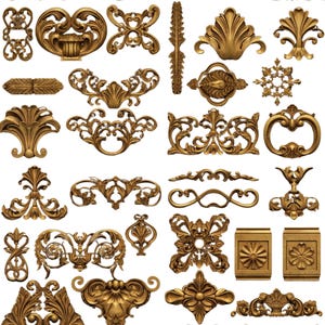 May include: A collection of ornate, gold-colored decorative architectural elements. The image showcases various designs, including floral, scrollwork, and symmetrical patterns. These elements appear to be cast or molded, with intricate details and a metallic finish.