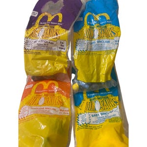 Vintage Lot of 4 McDonalds Happy Meal Toys Dino-Motion Dinosaur Toys 1990s New