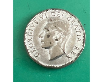Moneda canadiense de 5 centavos de 1952 con diseño de castor y retrato del rey Jorge VI