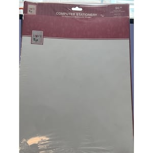 May include: A package of computer stationery with a pink and white design. The package features a red heart with the word "LOVE" printed on it. The package includes 20 designed stationery sheets. The price is $4.29.