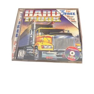 May include: A computer game case for Hard Truck 3, a Windows 95/98 game. The case features a yellow and black semi-truck on a highway. The game is rated E for Everyone by the ESRB.
