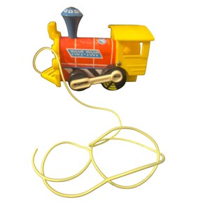 May include: A colorful toy train with a yellow pull string. The train is primarily red and yellow, with a blue smokestack and the words "TOOT-TOOT" on the side. The wheels are black and white.