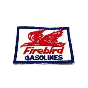May include: Red and blue embroidered patch with a red bird in flight and the text "Firebird Gasolines".