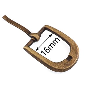 May include: A gold-toned metal buckle with a 16mm width. The buckle has a simple, classic design and is perfect for adding a touch of elegance to any leather belt.