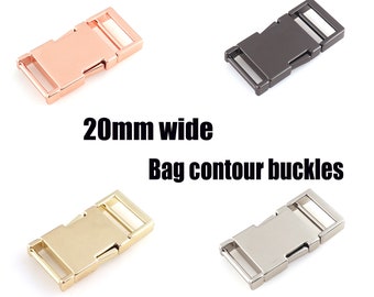 Puede incluir: Cuatro hebillas de contorno de bolsa de 20 mm de ancho en diferentes acabados: oro rosa, negro, oro y plata.
