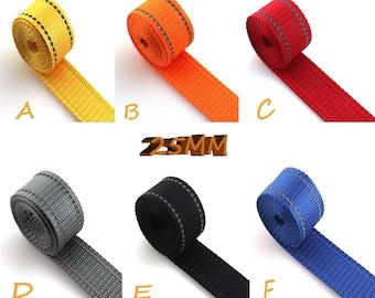 May include: Six rolls of 25mm wide webbing with reflective trim in various colors: yellow, orange, red, gray, black, and blue.