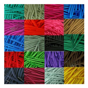 May include: A collection of shoelaces in various colors, including red, blue, green, purple, brown, black, and yellow. The shoelaces are arranged in a grid pattern.
