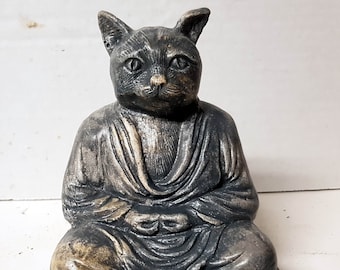 Cat buddha sale statue meaning