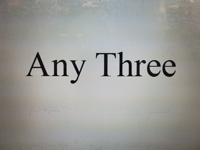 May include: The words "Any Three" are displayed in a black, serif font against a light gray background. The text is centered and appears to be a title or a heading.
