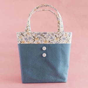 Small handbag in canvas monogrammed colors. Natural …