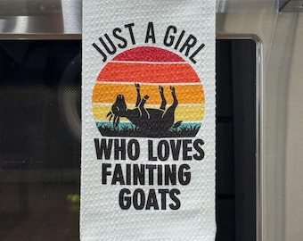 Girl who loves fainting goats kitchen towel