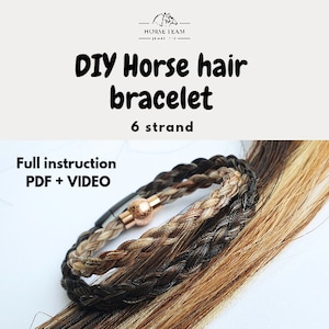 May include: DIY horse hair bracelet, 6 strand, full instruction PDF + VIDEO. A close-up of a braided horsehair bracelet with a gold clasp.