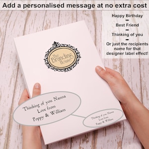 May include: White gift box with a black and white logo that says "The Branding House". The box has a personalized message that says "Thinking of you Nanna Love from Poppy & William".