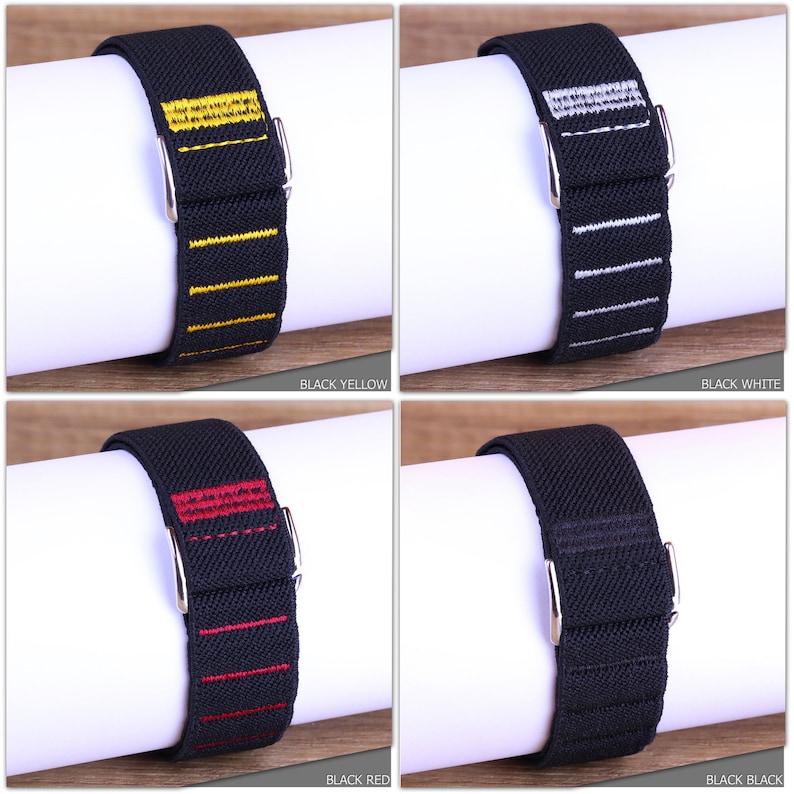 May include: Four black elastic watch bands with different colored stripes. The bands are black with yellow, white, red, and black stripes.
