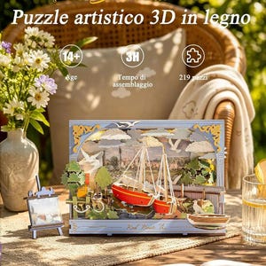 May include: A 3D wooden artistic puzzle featuring a nautical scene with two red boats, green trees, and a town in the background. The puzzle includes 219 pieces, is labeled for ages 14+, and has a 3-hour assembly time. The text reads Barche rosse, Puzzle artistico 3D in legno, 14+, 3H, 219 pezzi, and Red Boats.