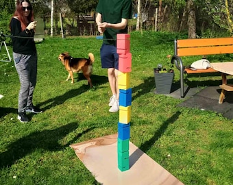 Juego de apilamiento de bloques en equipo cooperativo