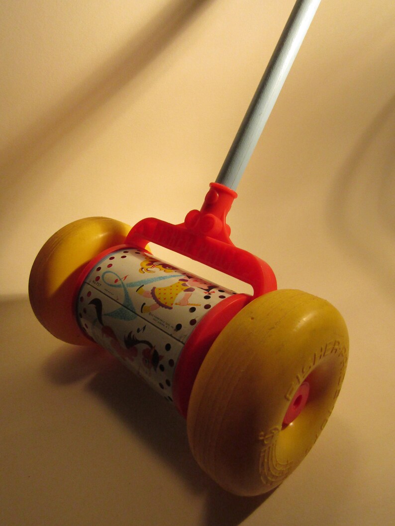 Vintage 1963 Fisher Price push toy with a wooden handle Etsy
